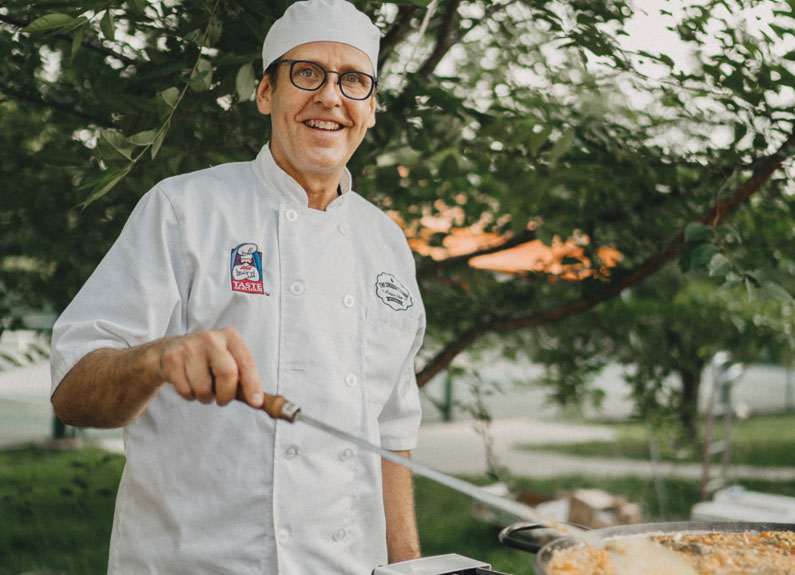 the croquetterie owner inigo gondra prepares paella