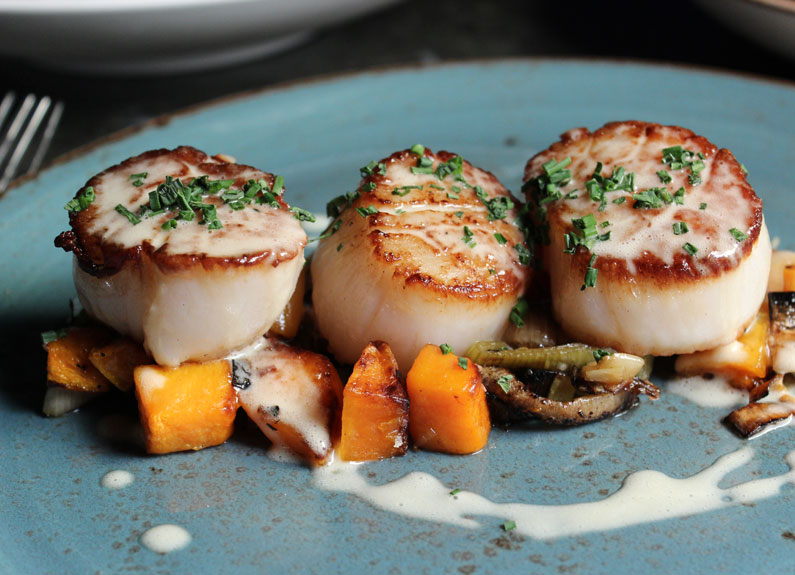 scallops with squash and leeks at boundary at the cheshire in clayton