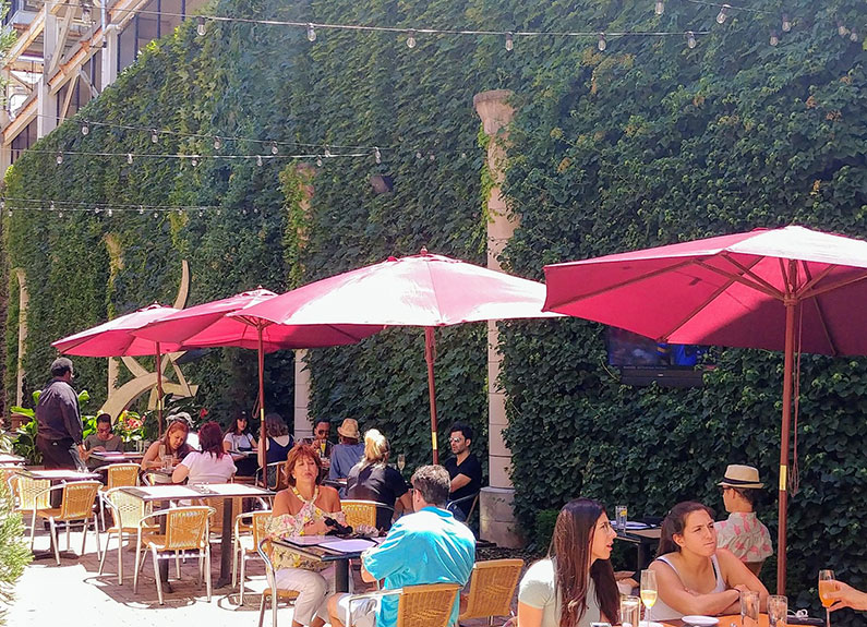 the patio at scape american bistro in the central west end