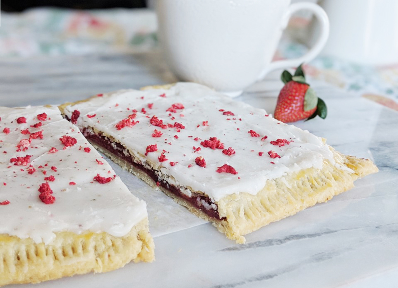 a large strawberry toaster pastry cut in half 