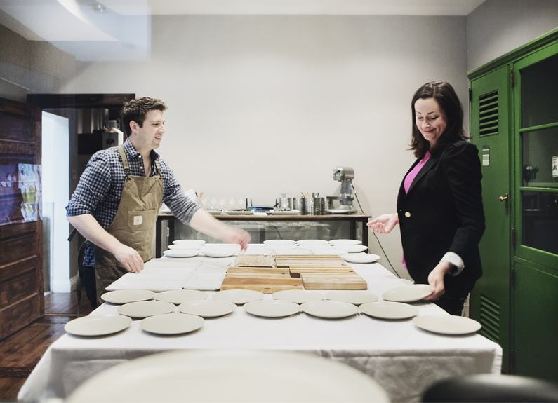 a man and a woman in a kitchen