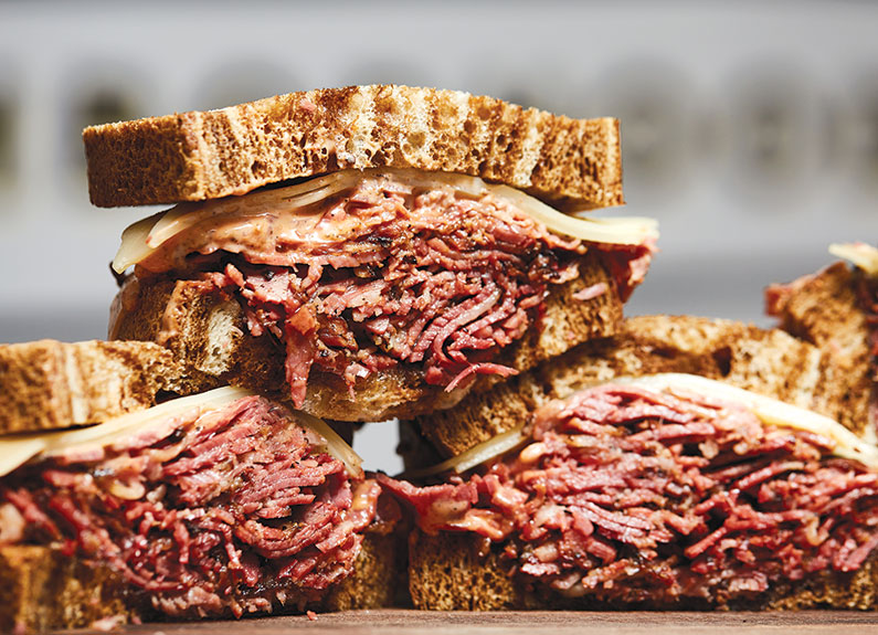 pastrami sandwiches from nomad inside tamm avenue bar in dogtown