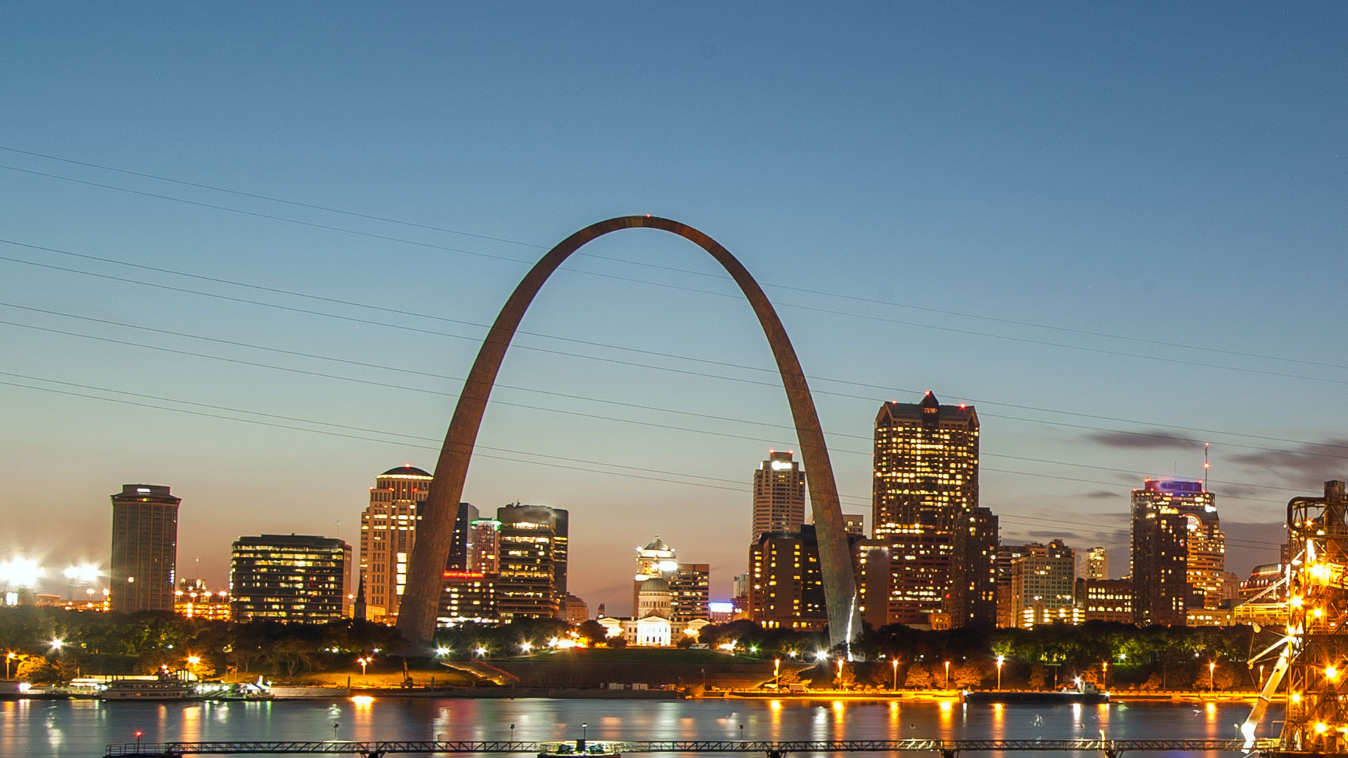 the downtown st louis skyline at sunset