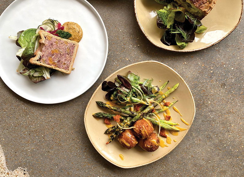 sliced pâté en croûte and a spring salad at bolyard's meat & provisions