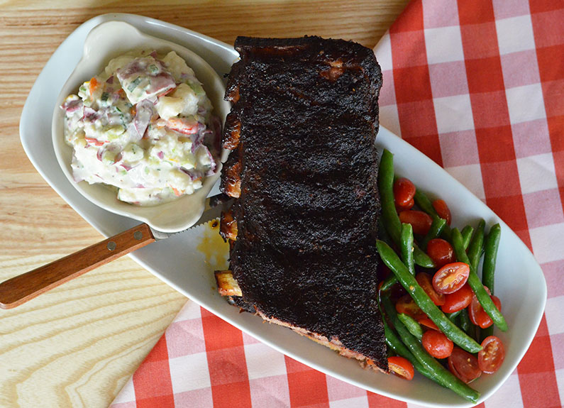 smoked ribs with sides at salt + smoke in st. louis