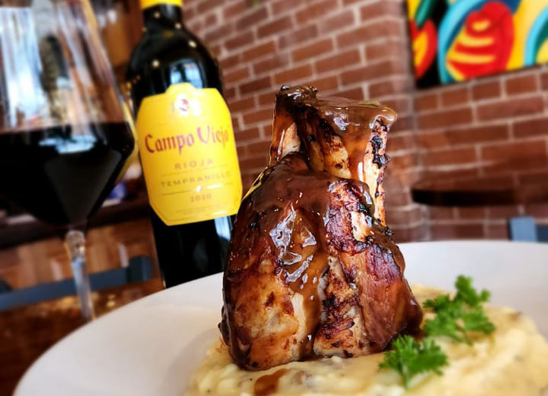 slow-cooked pork shank at grüv bistro & wine bar in edwardsville