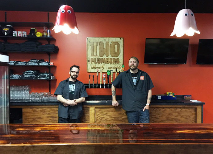 from left, two plumbers' head brewer John Simon and owner Robert Schowengerdt