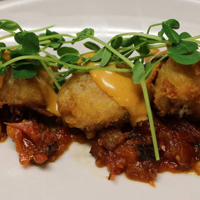 spicy crab beignets at vin de set in st. louis