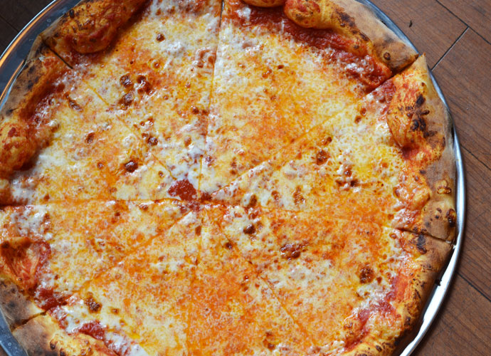 A 20-inch cheese pizza is available whole or by the slice. 