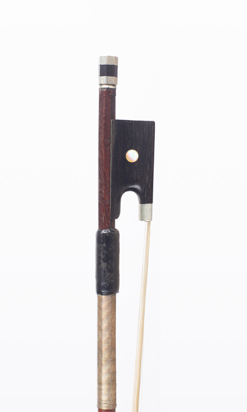 A nickel-mounted violin bow, branded Buthod