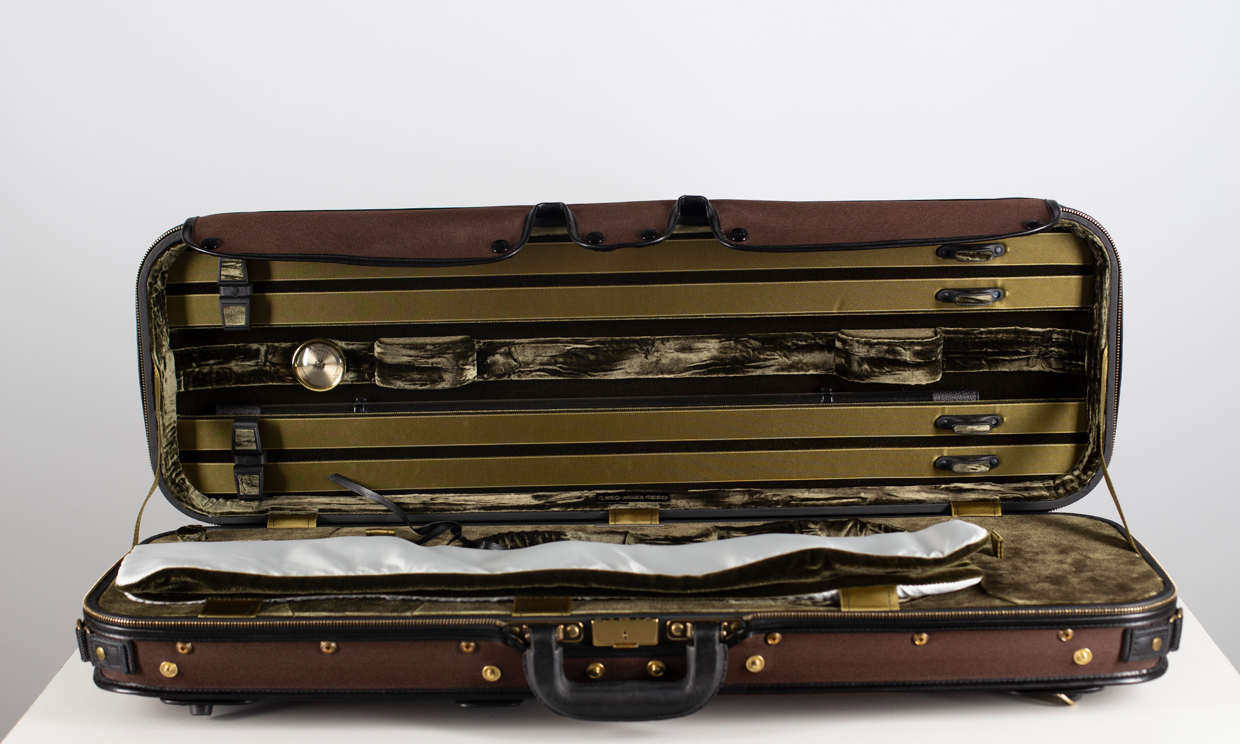 A violin case, branded Jaeger