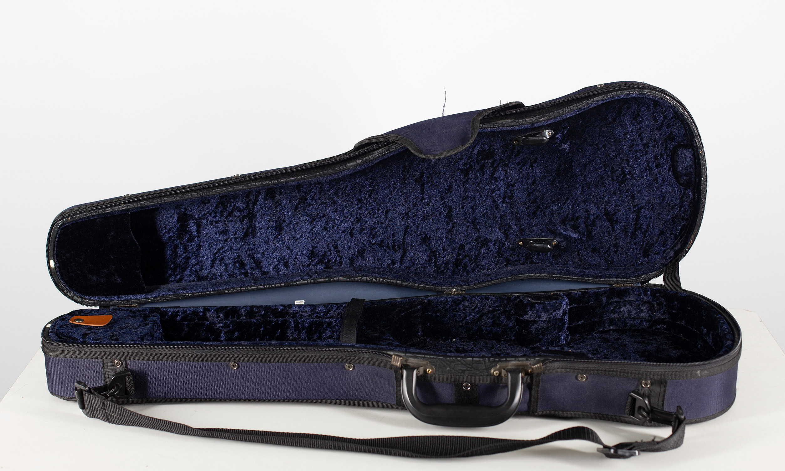 A pair of blue violin cases, unbranded