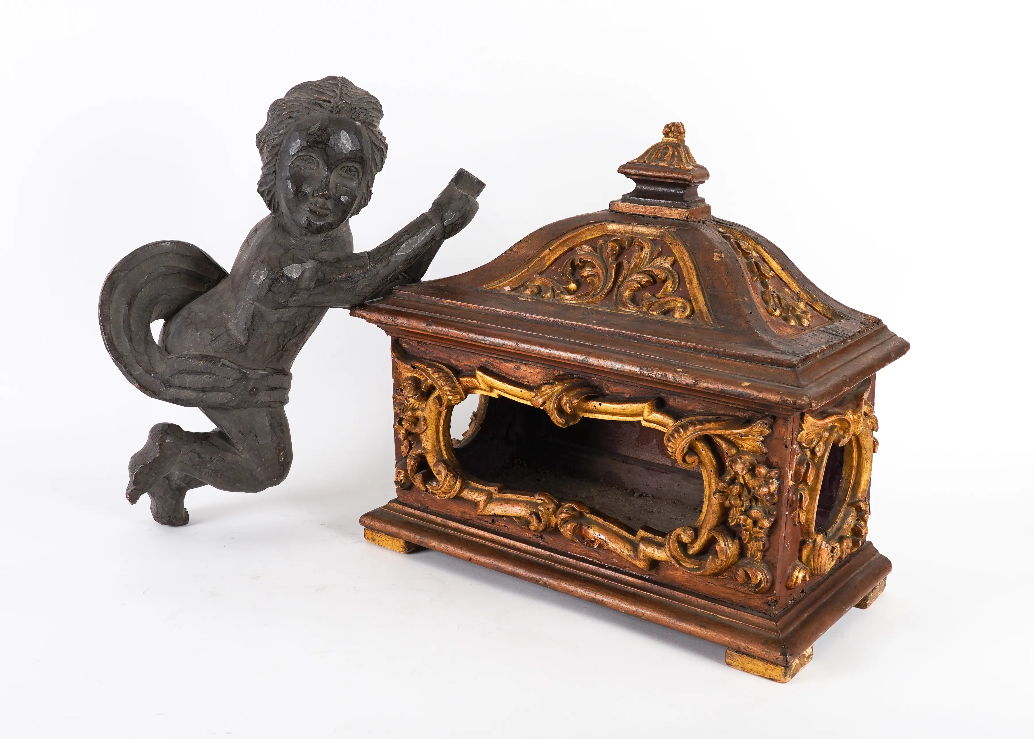 AN ITALIAN CARVED GILT AND RED MICA DECORATED RELIQUARY CASKET (2)