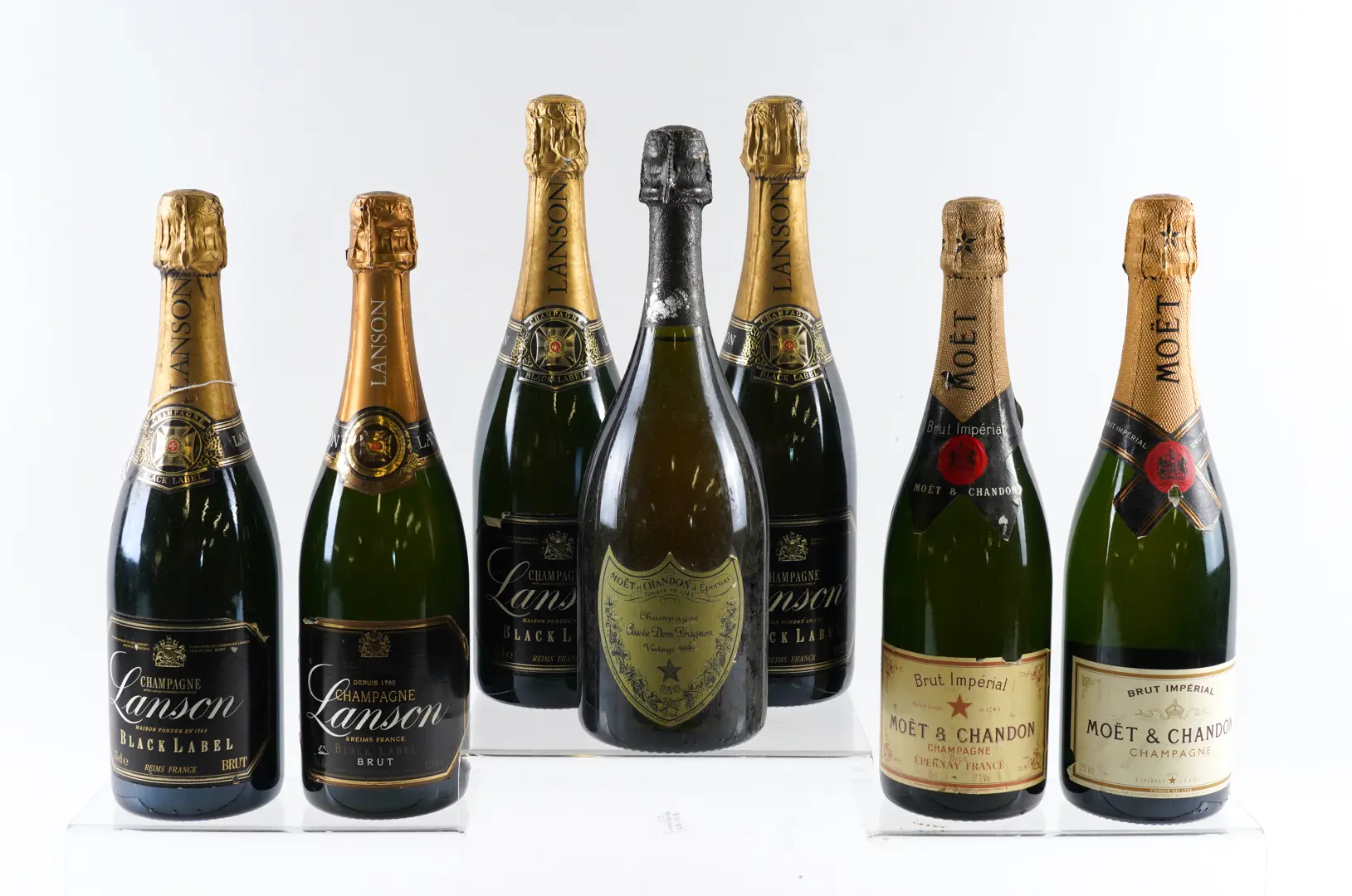 A BOTTLE OF DOM PERIGNON 1999 AND SIX OTHER BOTTLES OF CHAMPAGNE (7)