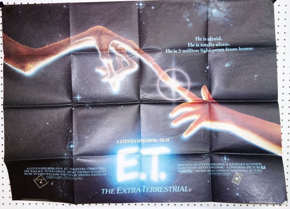 Film posters; 'E.T' together with lobby cards and exhibitor's campaign book.