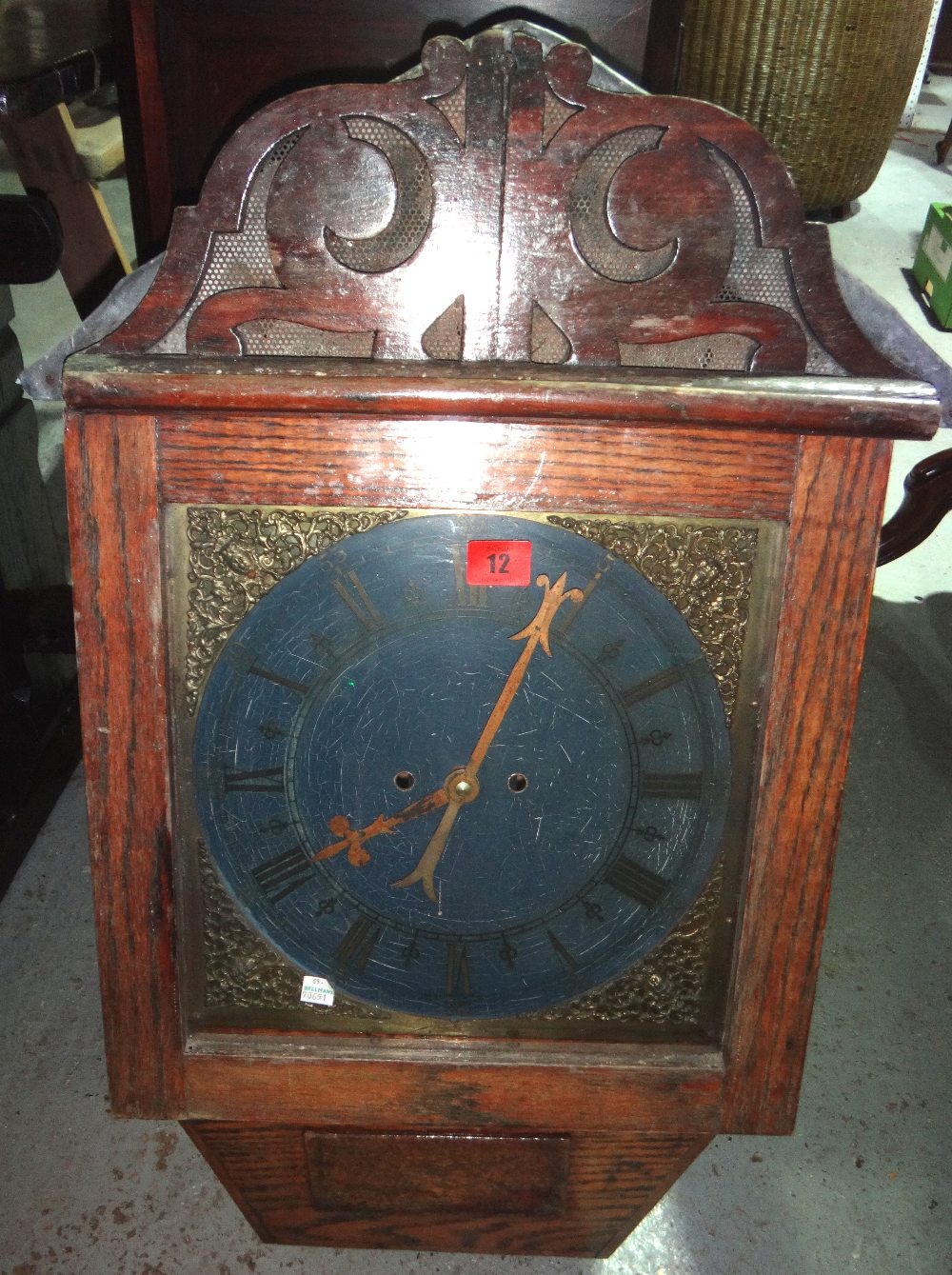 A large 20th century oak cased wall clock.