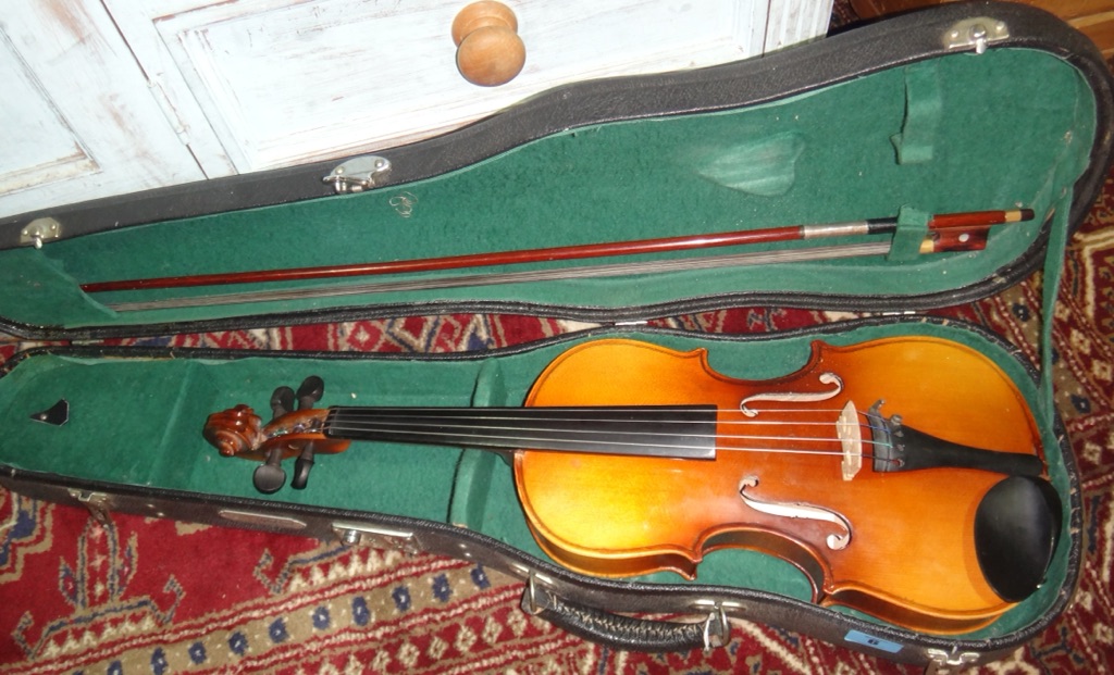 A 20th century cased violin.