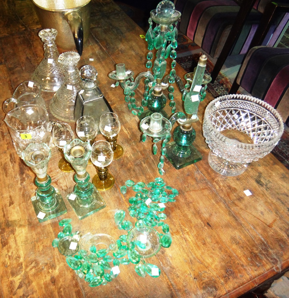 A group of 19th century and later glass including a pair of soda glass candelabra, decanters, jugs and sundry.