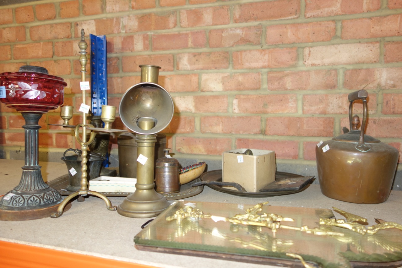 A group of metalware collectables, including a brass tray, a copper kettle, an oil lamp, a brass weight, pewter and sundry, (qty).