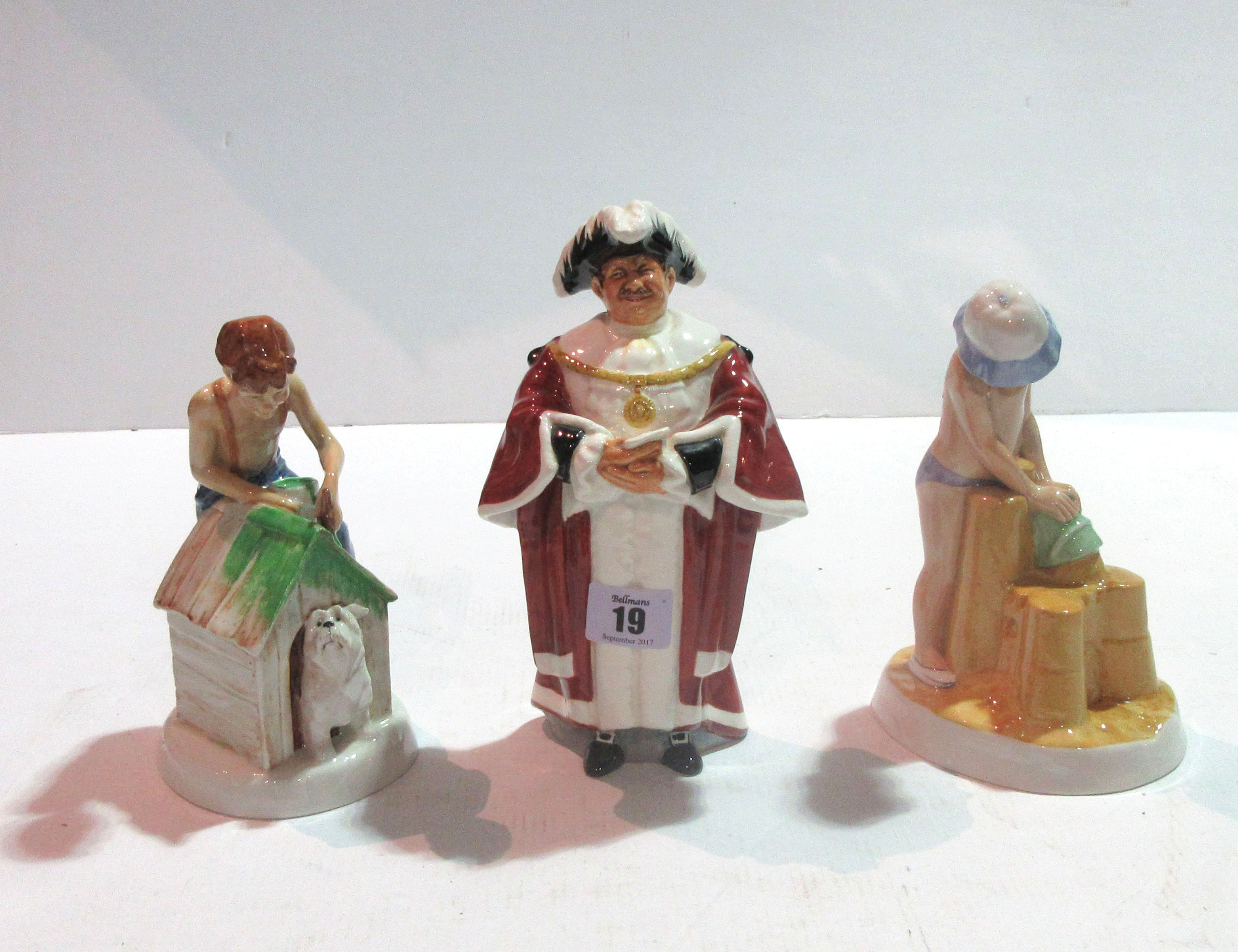 Ceramics comprising; A group of three Royal Doulton figures; ''The Mayor HN2286', 'As Good As New HN2971' and 'Just One More HN2980', (3).   S11M