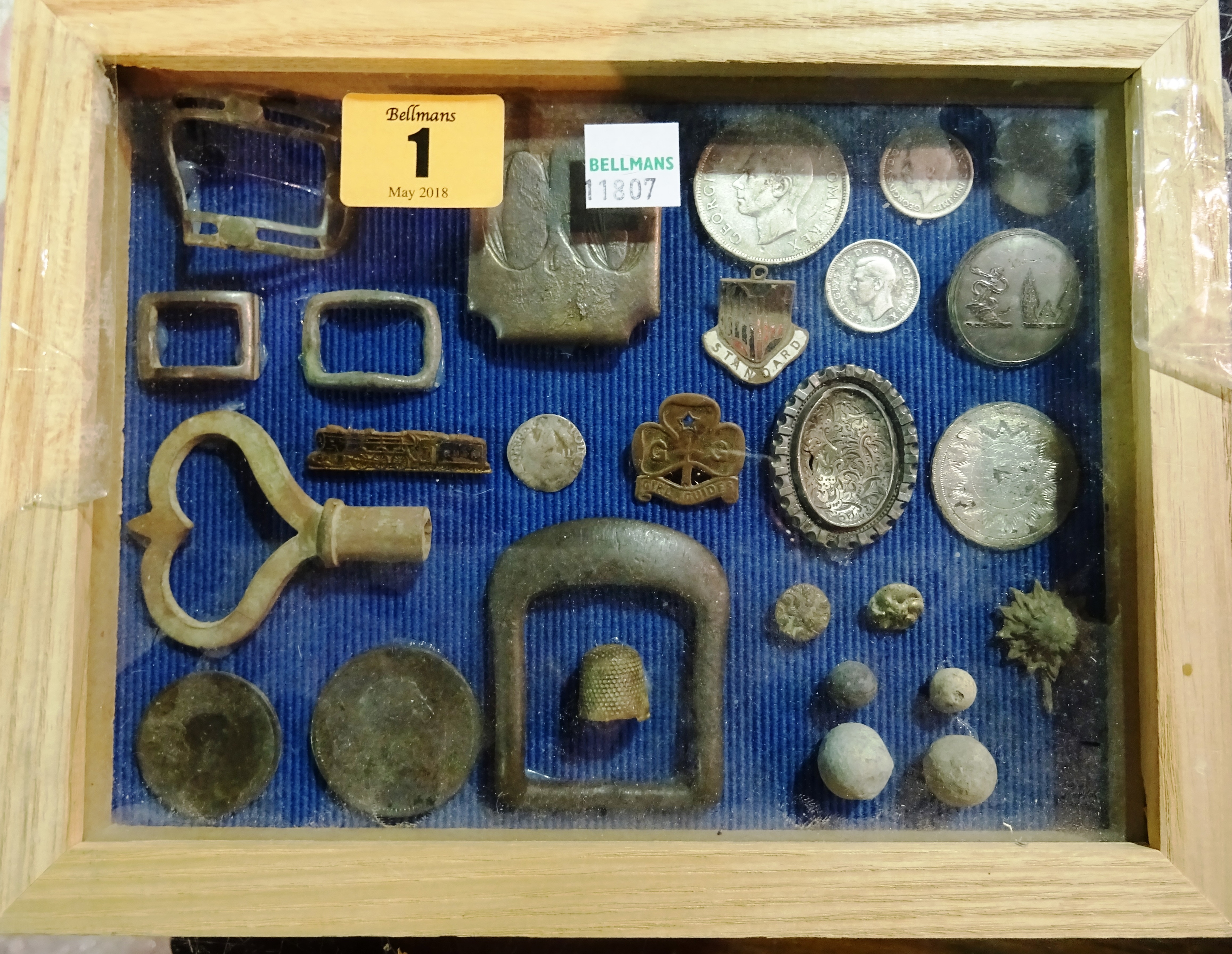A small glazed frame containing metal detector finds, including; coins, buckles, buttons and sundry, (qty)  CAB