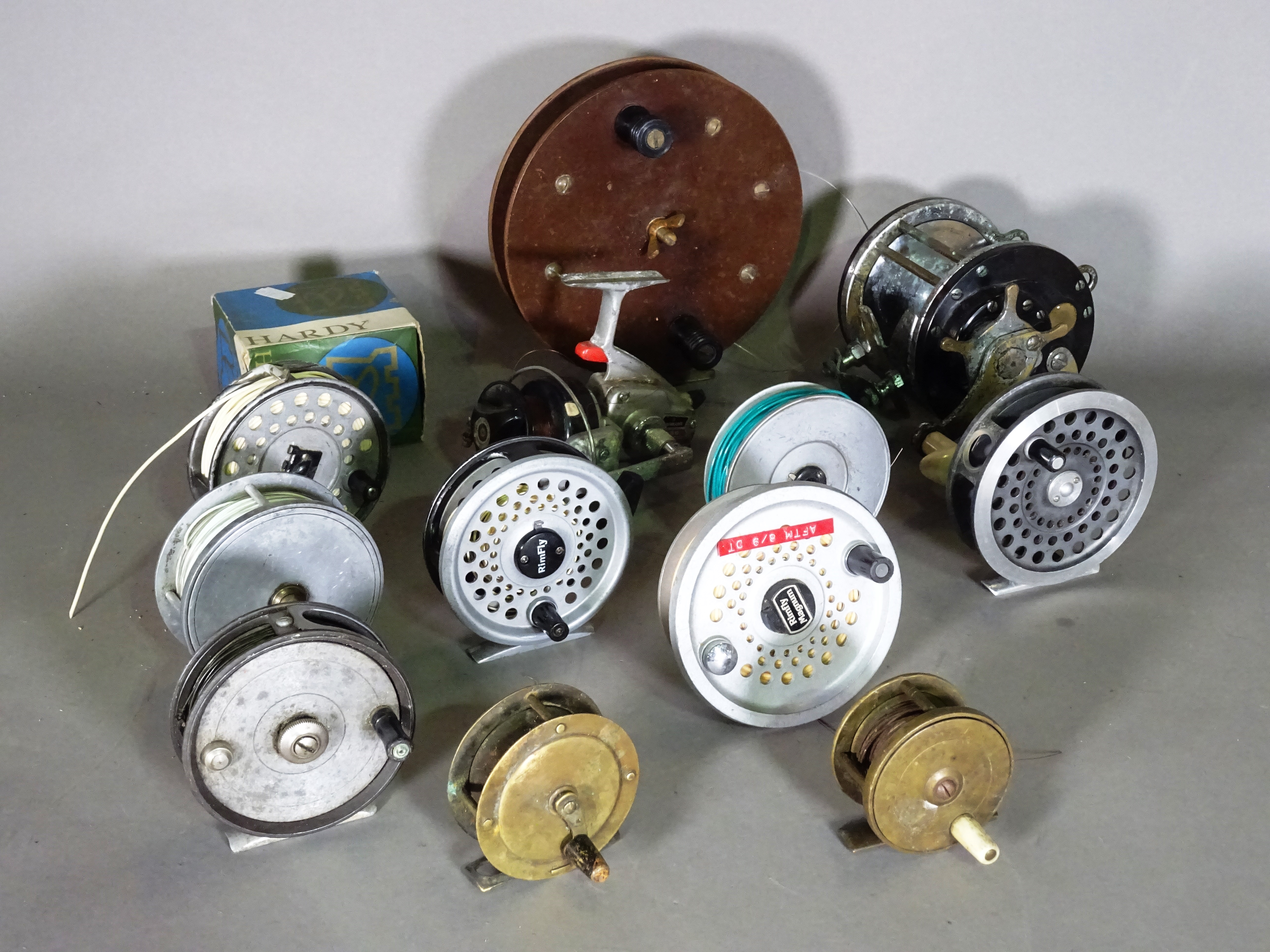 Fishing interest; twelve fishing reels, including a Hardy Sunbeam, a Hardy Viscount and others, (qty).   CAB