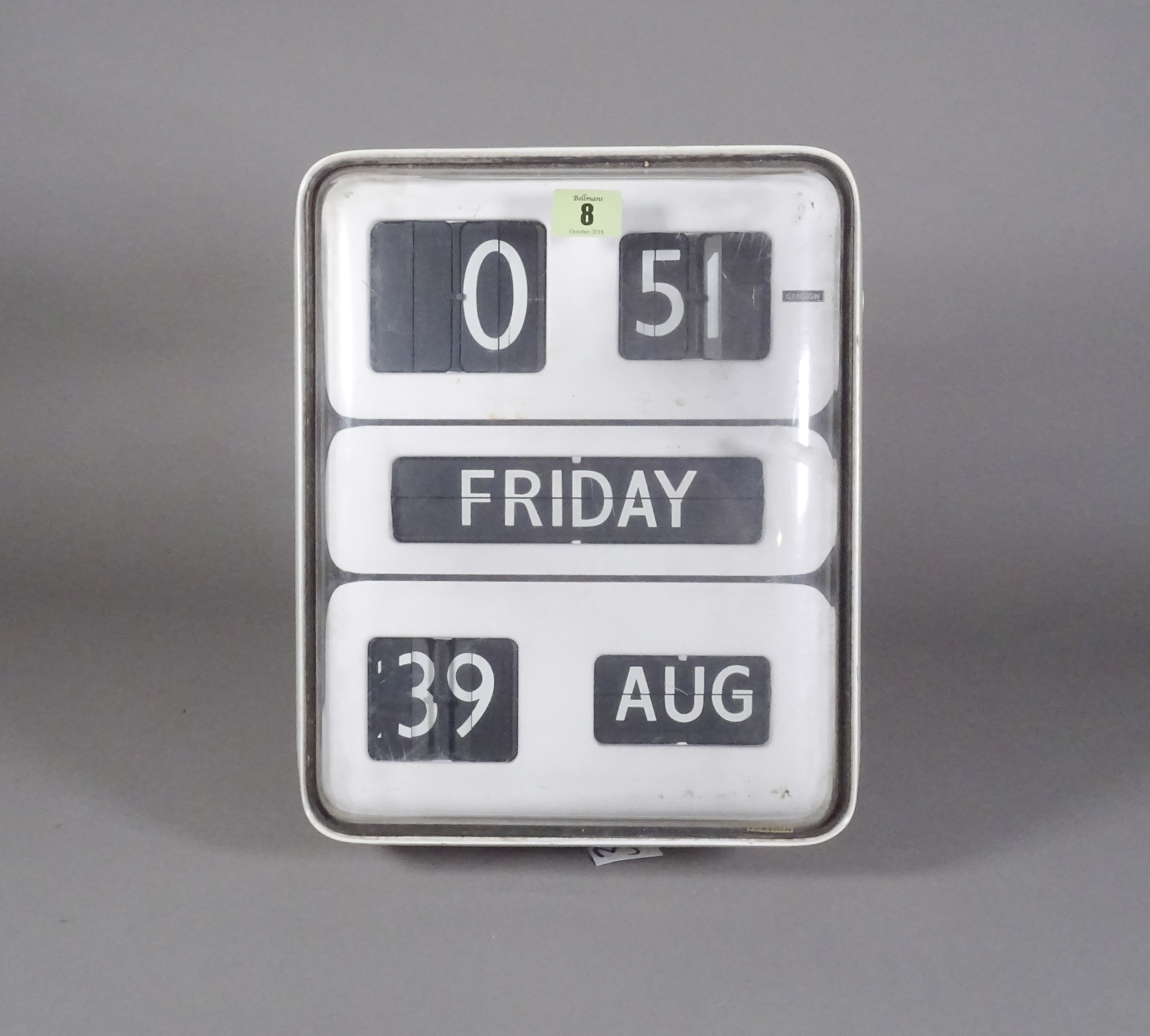 A Gensign digital clock and calendar. 26cm wide, 35cm tall.  S2T
