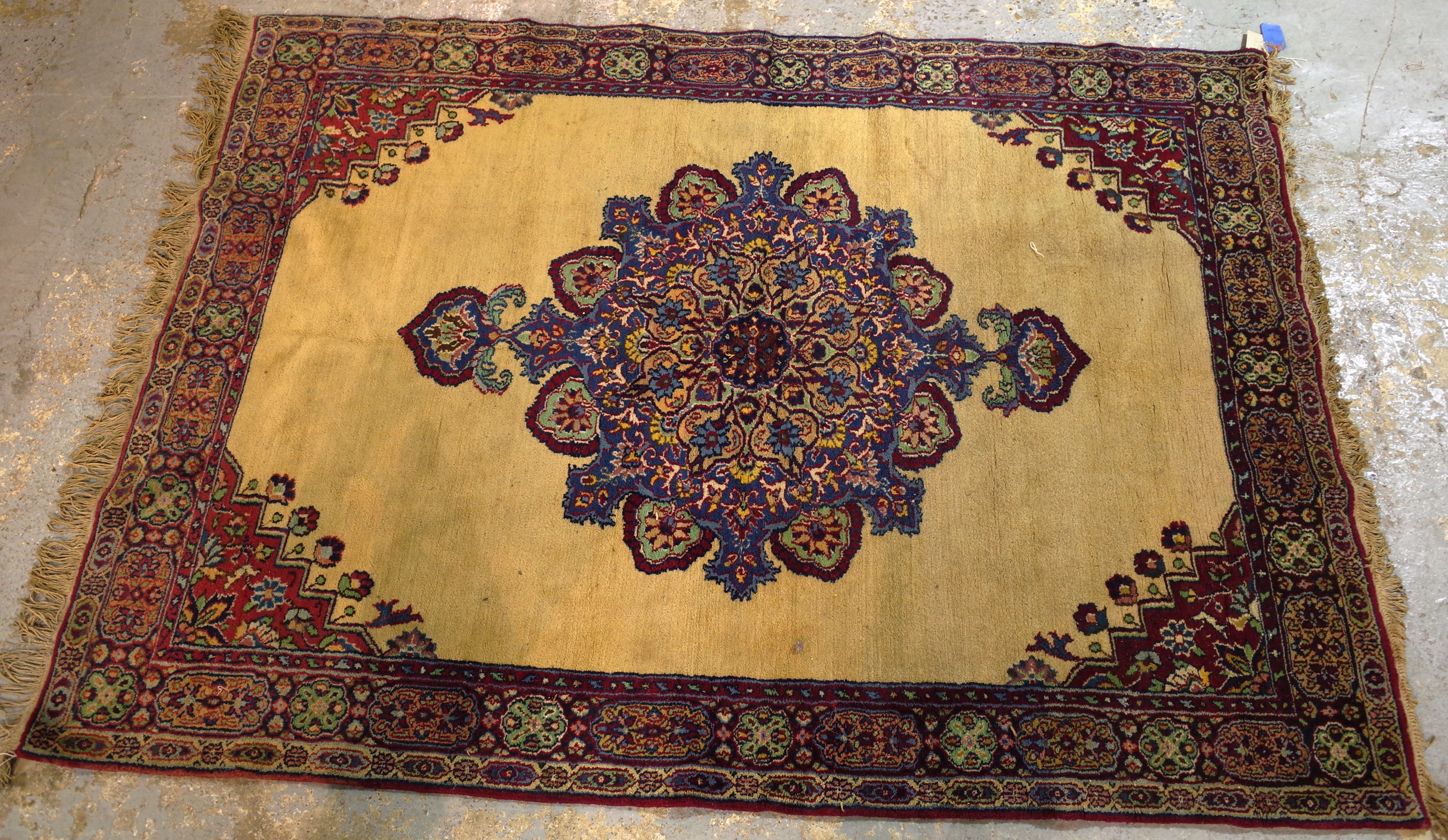 A Mashad rug, 214cm x 153cm.