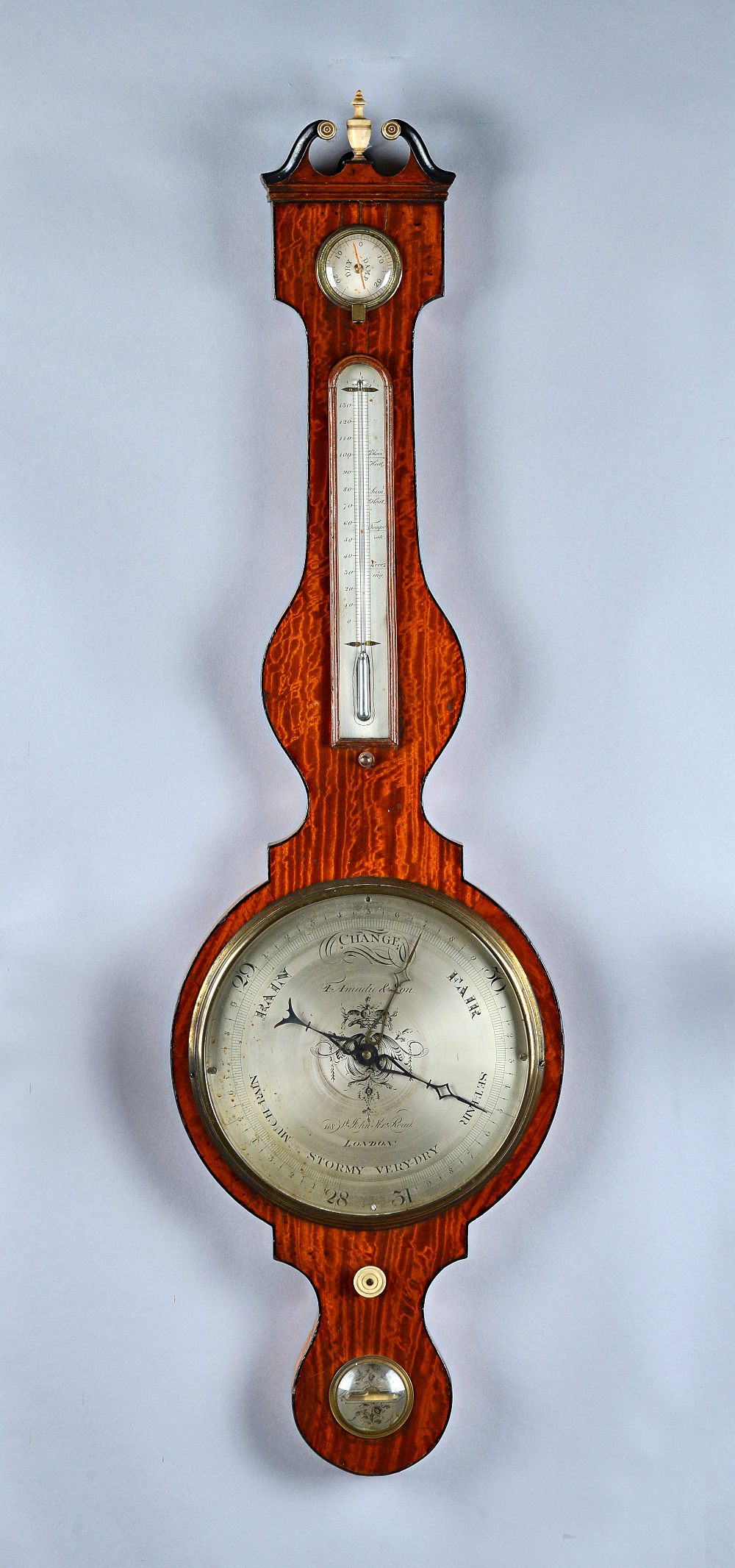 An early Victorian wheel barometerBy F. Amadio & Son, 118 St. John Street Road, LondonWith 10in silvered dial108cm high