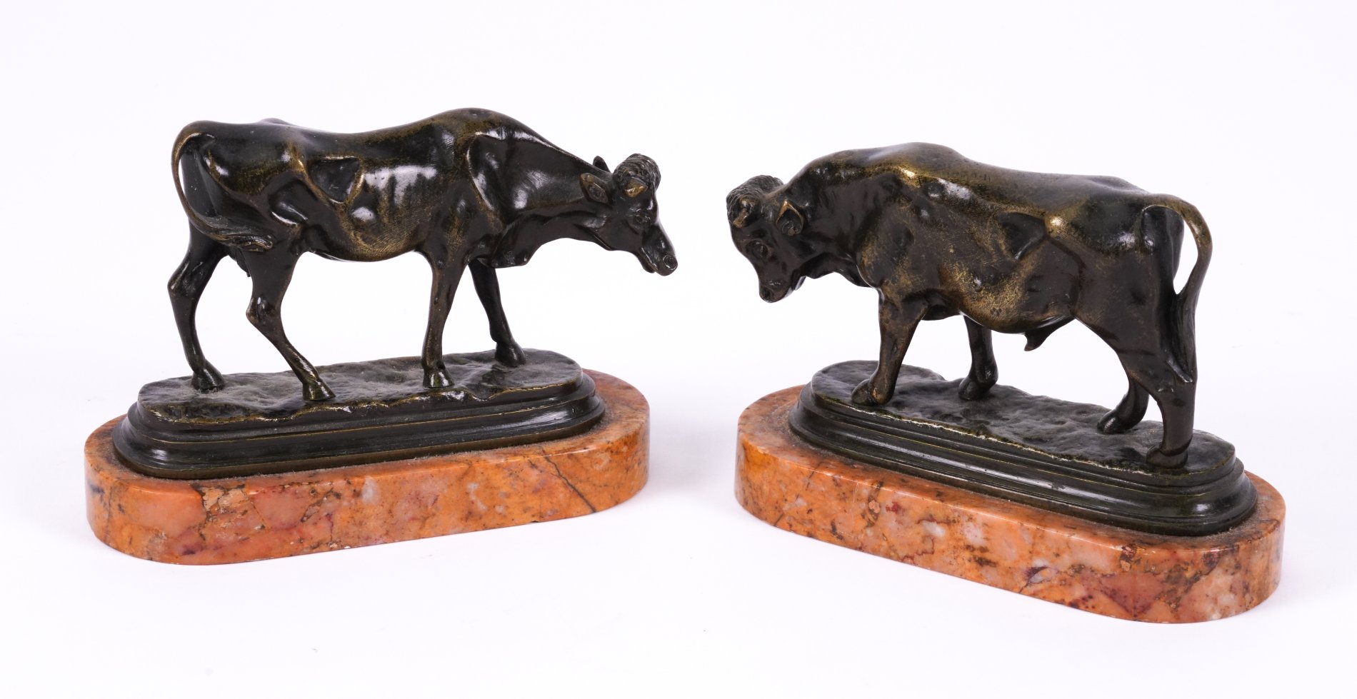 A PAIR OF FRENCH BRONZE FIGURES OF A  BULL AND COW (2)
