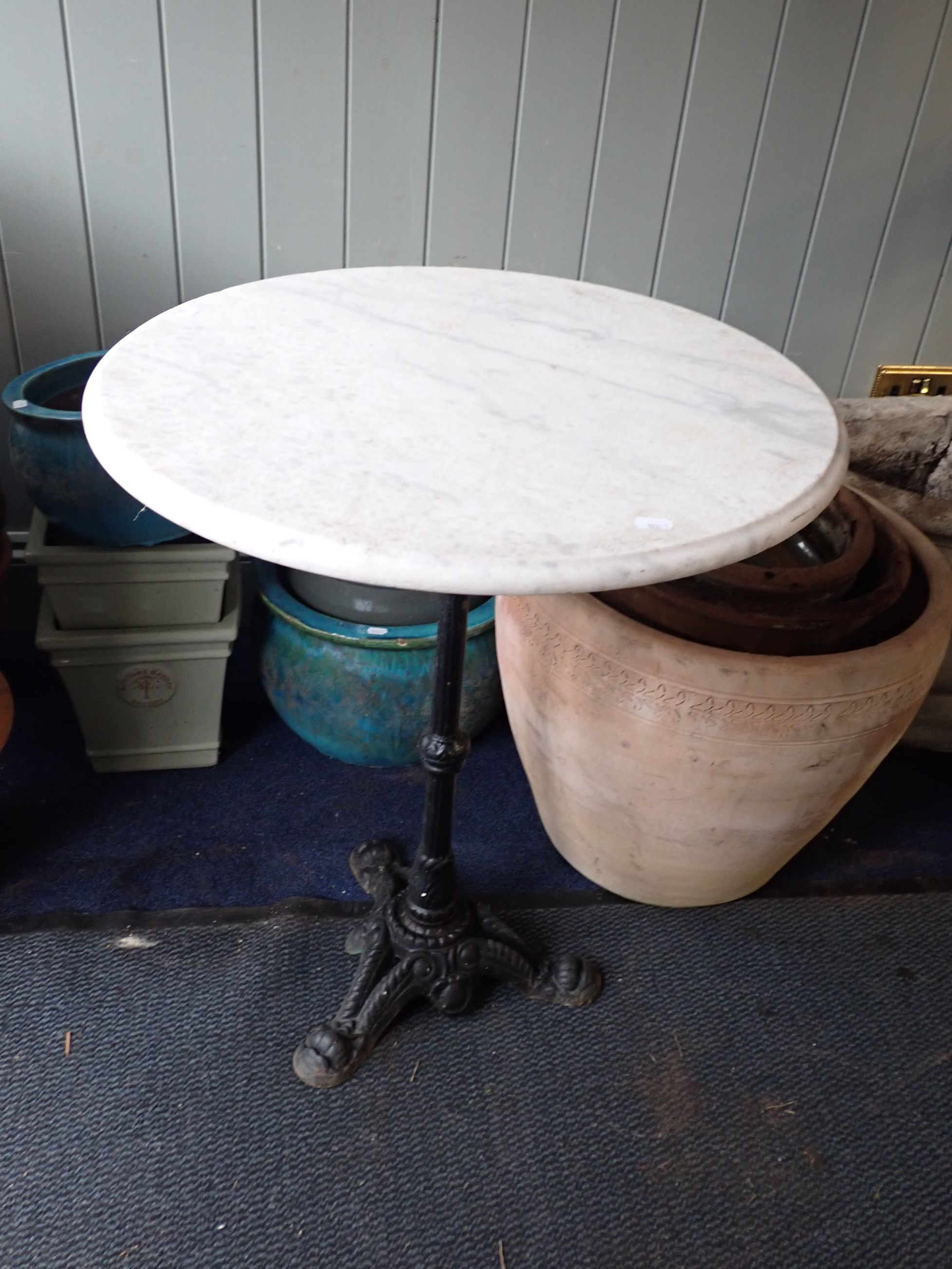 CAST IRON CAFE TABLE WITH CIRCULAR MARBLE TOP