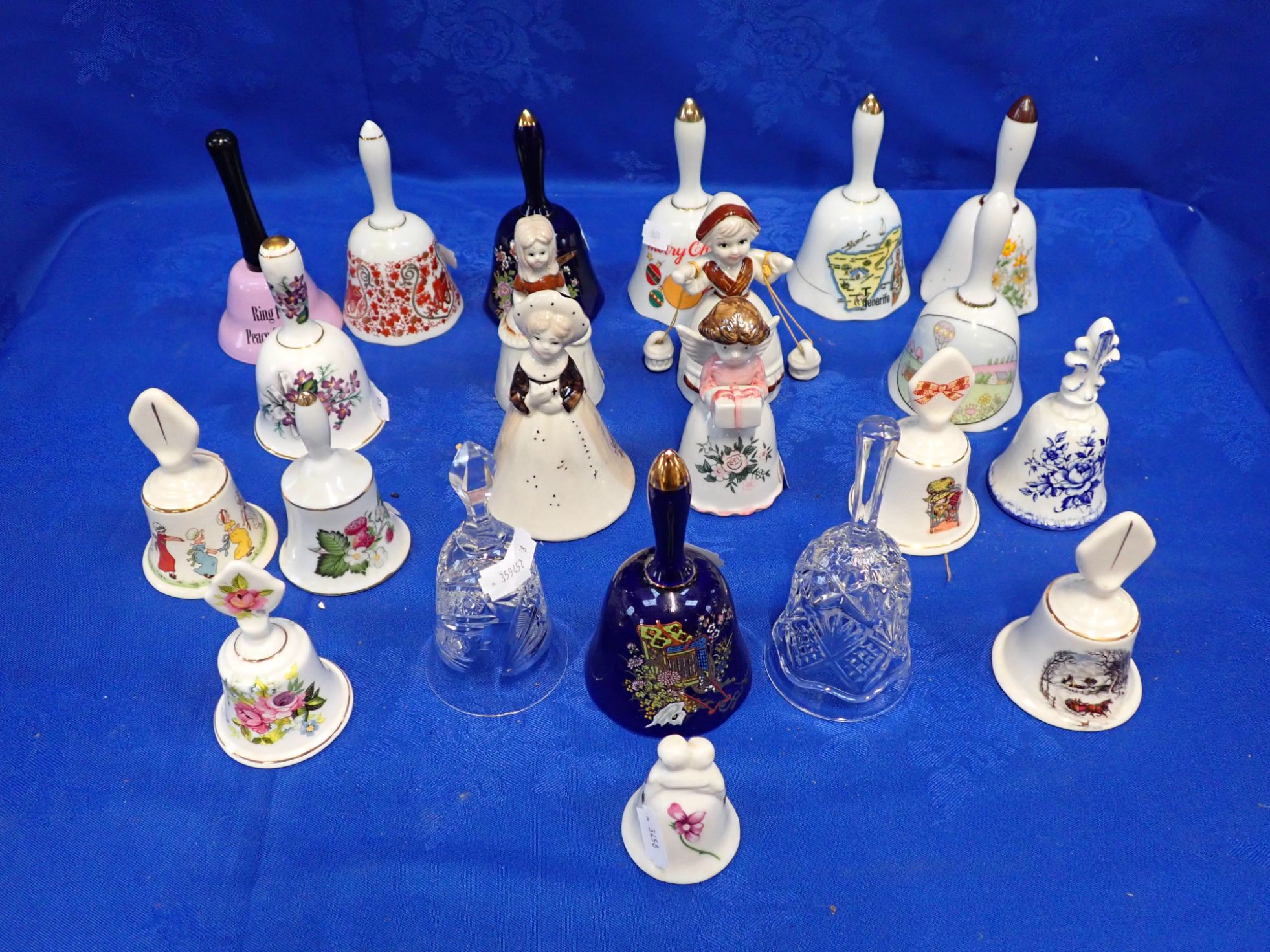 A COLLECTION OF CERAMIC BELLS