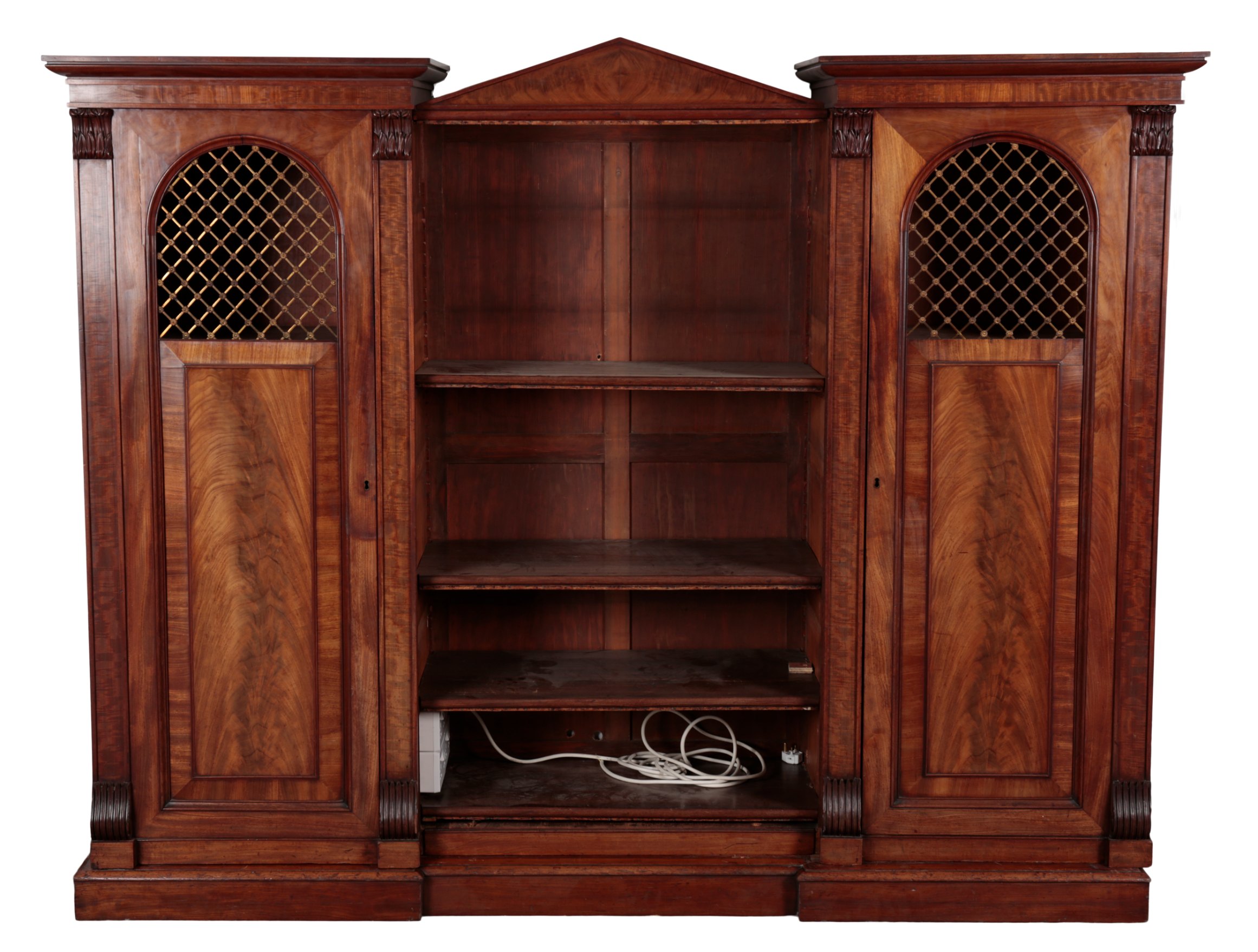 A WILLIAM IV MAHOGANY INVERTED BREAKFRONT BOOKCASE
