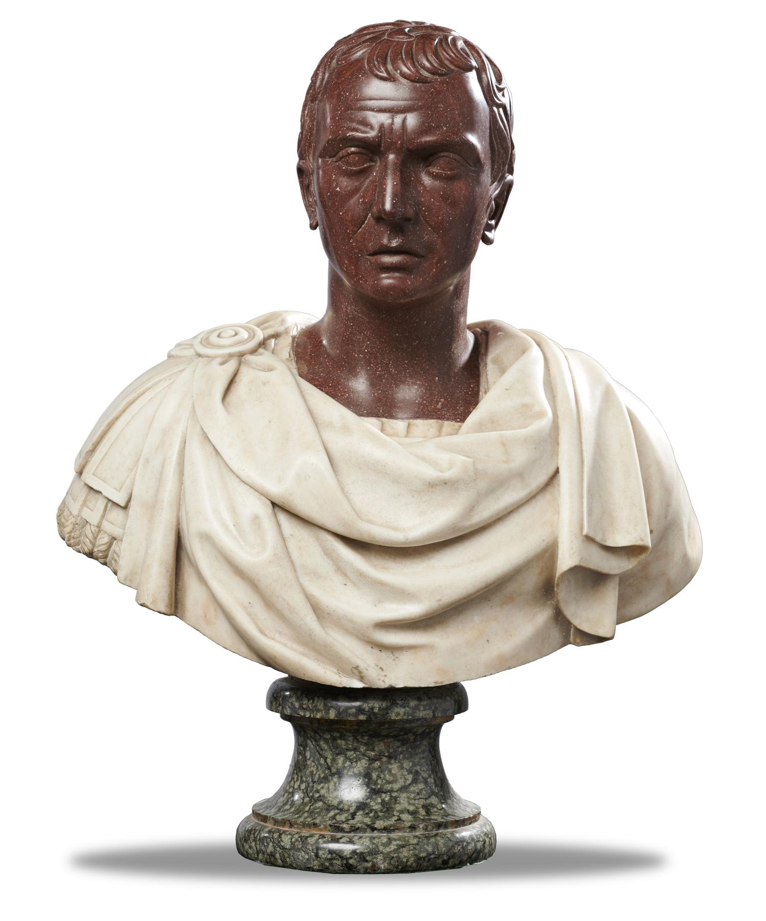 A Porphyry and white marble bust of a Roman Emperor Italian, 19th century on green marble socle 76cm high by 56cm wide by 26cm deep