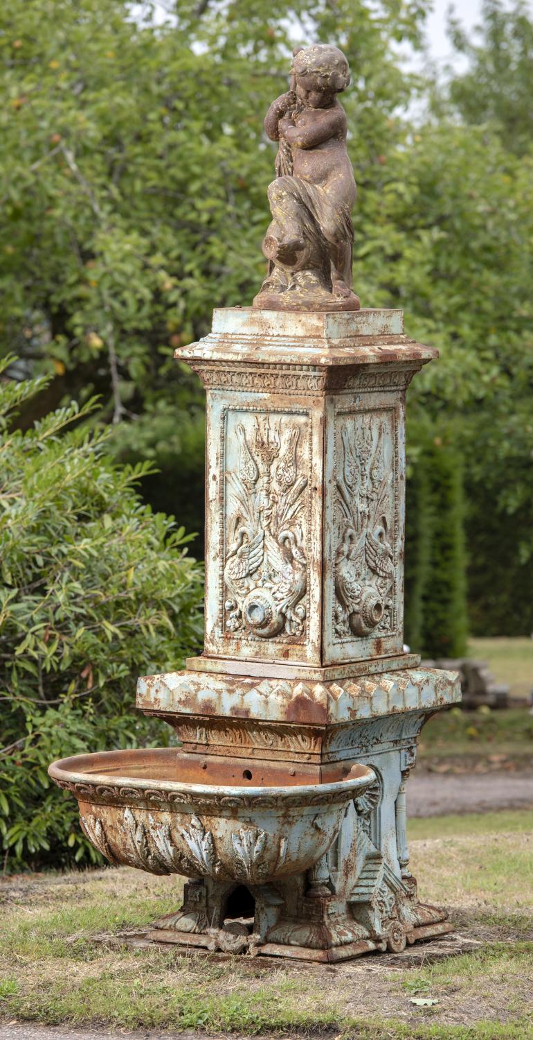 A rare Val d‘Osne foundry cast iron fountain 2nd half 19th century top mounted by a figure of a putti after Mathurin Moreau 248cm high, the bowl 94cm...