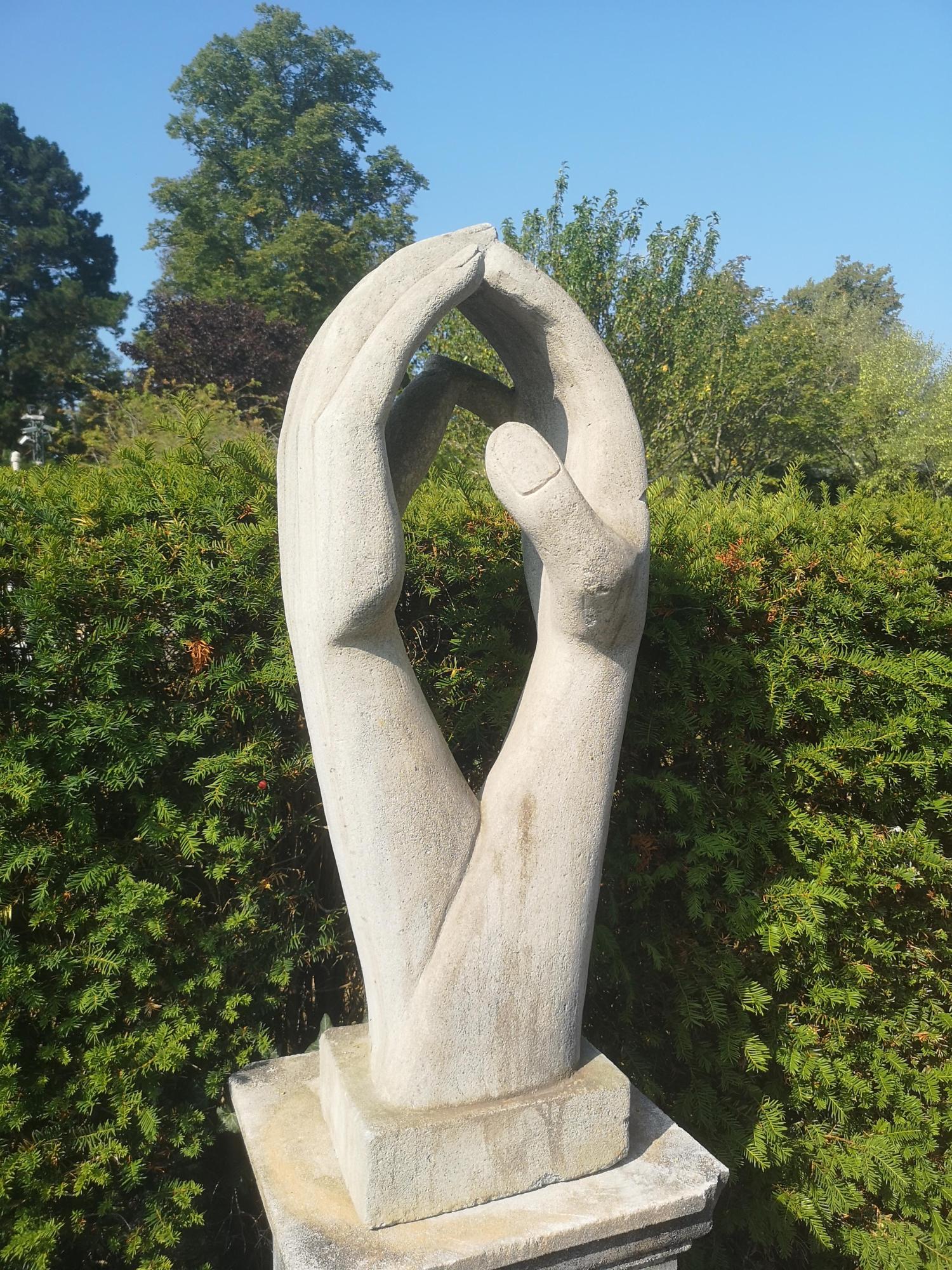 A composition stone group of hands 2nd half 20th century 102cm high