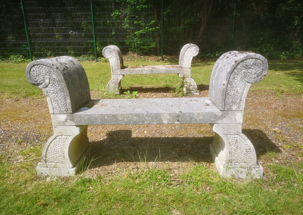 †A pair of carved limestone benches modern 148cm long