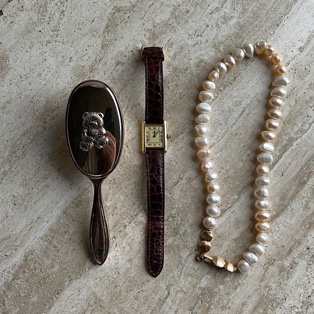 Vintage treasures 🤍 Found my baby brush that I got gifted 31 years ago 🥹, Pearl necklace made 23 years ago for my mums wedding & vintage Cartier watch from my great aunt.