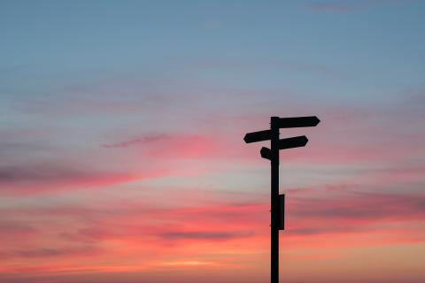 Background image of the header, two arrows choose a path