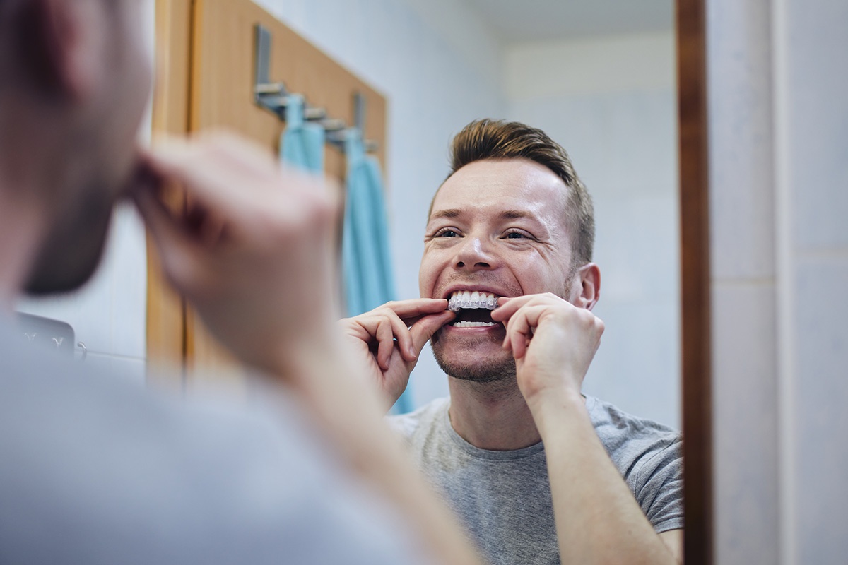 man with invisalign 