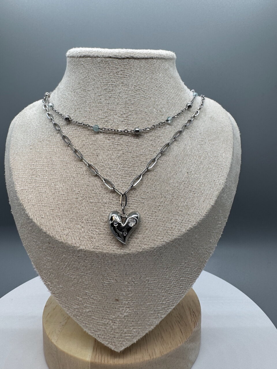 Double Layer Heart Necklace with Aquamarine strand and a paper clip layer.