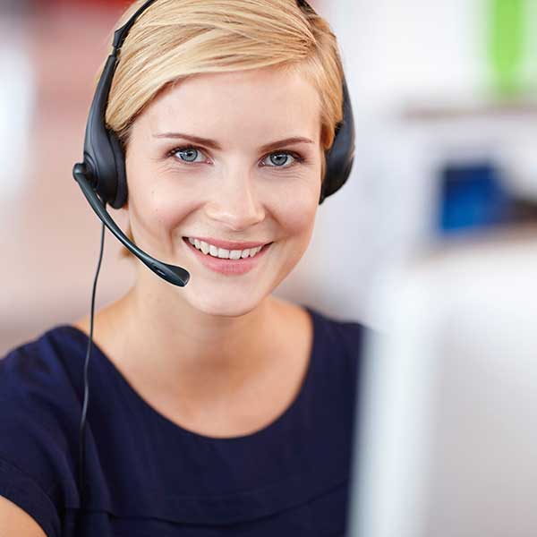 Woman with a headset on | MMI Climate Solutions customer support in Lexington, KY