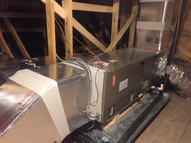 Bryant attic Air Handler in attic with sealed duct.