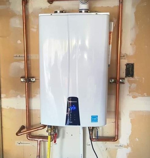 Tankless water heating unit installed by A Quality Plumber