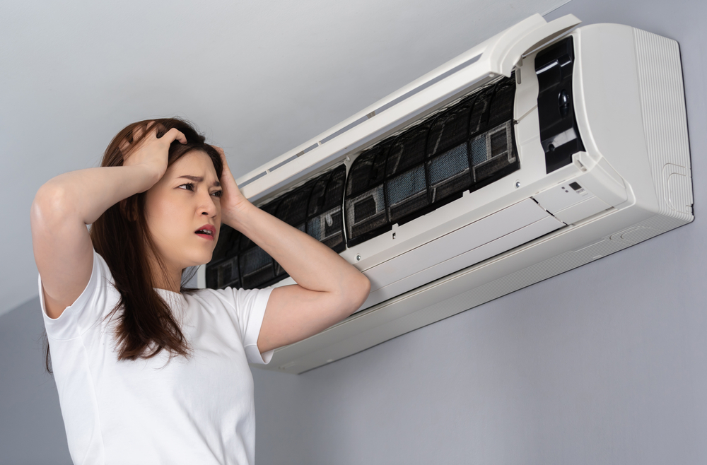 woman needs ac repair in Florham park nj