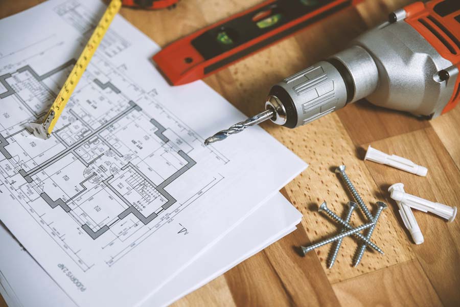 floor plan with tape measure