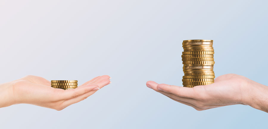 two hands holding coins