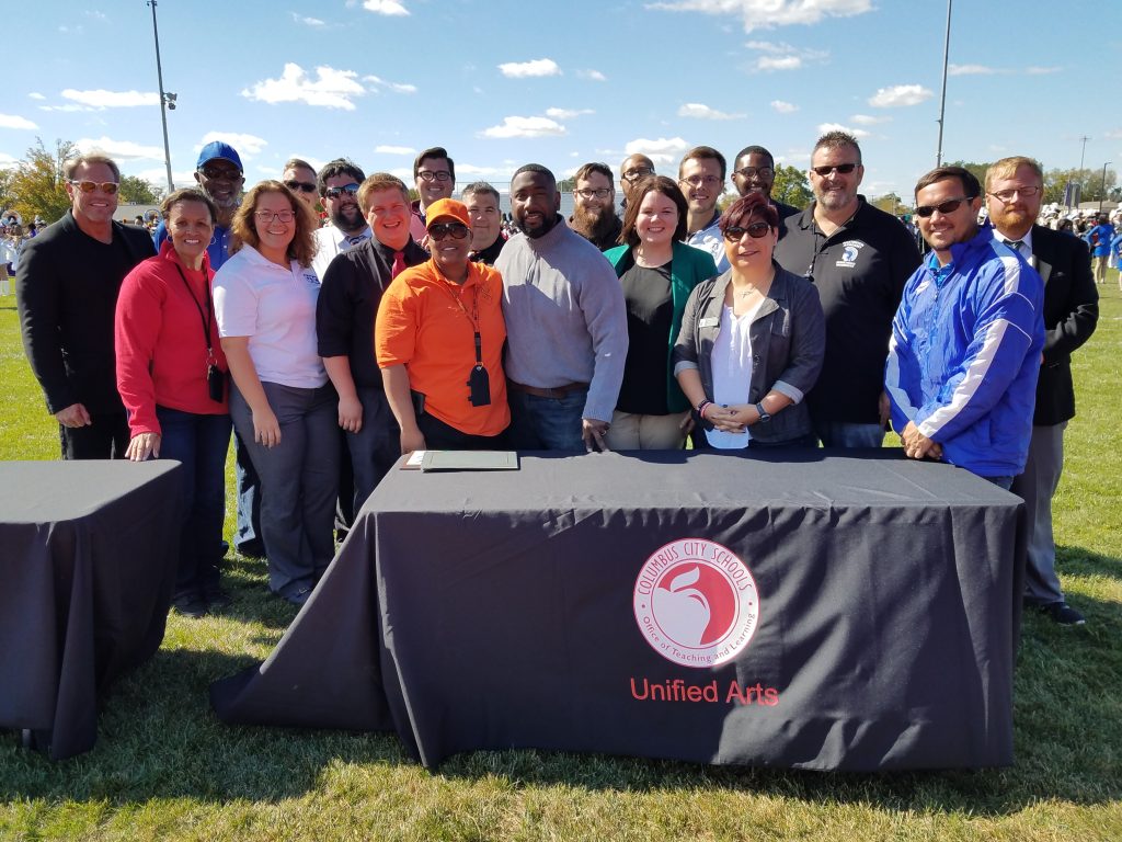 Dr. Hill with district HS band directors and some Board Members at Marching Band Festival