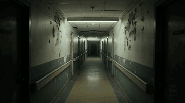 AI-generated horror scene of a flashlight sweeping a derelict corridor where a figure briefly appears
