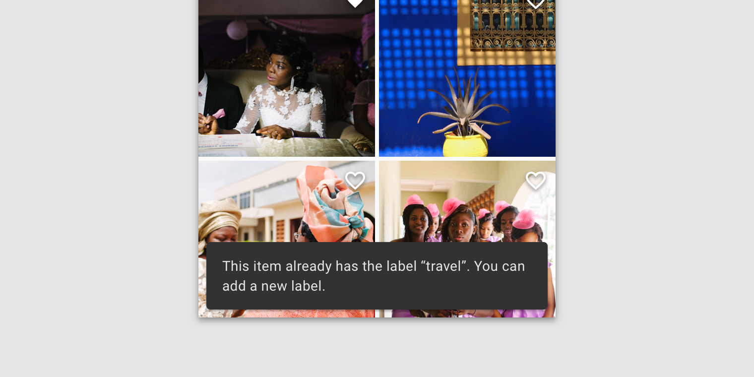 Two line text label on mobile. Snackbar text label is This item already has the label “travel”. You can add a new label.
